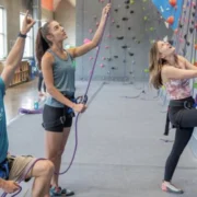 an image of Movement members taking a climbing class